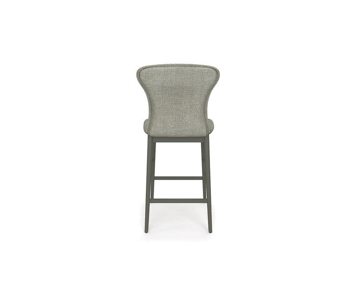 The Slater Bar Stool, featuring a gray upholstered cushioned seat, a curved backrest, and sturdy wooden legs, is shown from the back against a plain white background. This contemporary bar stool brings modern elegance to any space.