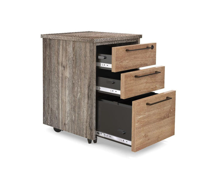 The Slater Mobile Pedestal is a wooden filing cabinet with a wood grain finish, featuring three partially open, lockable drawers with metal handles and visible casters on the bottom, set against a white background.