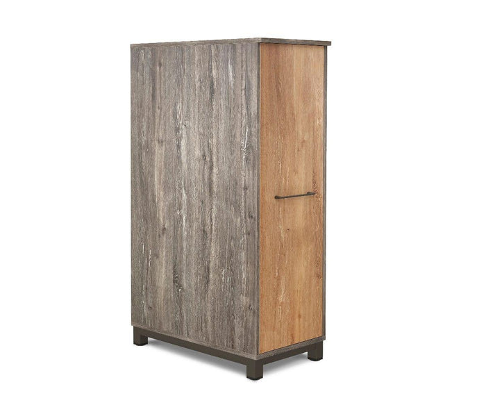 Tall rectangular wooden cabinet with a single door in a lighter wood tone, featuring a vertical metal handle, grayish wood grain sides, and short square legs, displayed against a white background. This contemporary piece exemplifies modern wood grain furniture design and is presented here as the Slater Single Height Cabinet.