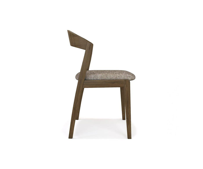 Side view of the Soro Dining Chair, featuring a modern wooden frame, light brown cushioned seat, and an angled backrest, set against a white background. This stylish upholstered chair seamlessly combines comfort and elegance, making it an ideal addition to any contemporary or mid-century-inspired dining space.