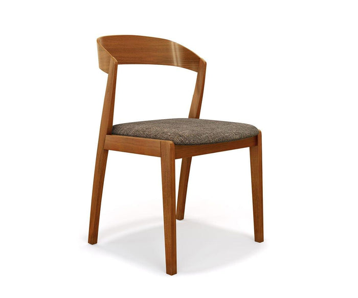 Introducing the Soro Dining Chair—a modern and minimalist wooden dining chair designed with angled legs, a curved backrest, and a padded brown seat cushion. This mid-century piece effortlessly combines style and comfort, making it an ideal addition to any contemporary space.
