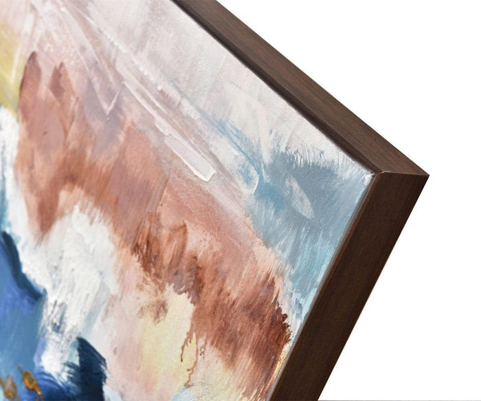 A close-up of the corner of the Spring Valley Oil Painting, showcasing textured brushstrokes in blue, brown, white, and beige hues on canvas with a dark brown frame. This striking piece of abstract wall art adds a touch of contemporary decor to any space.