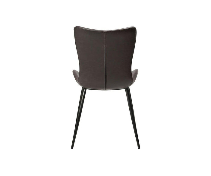 The Steele Dining Chair is shown from behind, featuring a modern design with a dark brown cushioned, curved backrest and seat. Slim black metal legs complement its minimalist style, all set against a white background.