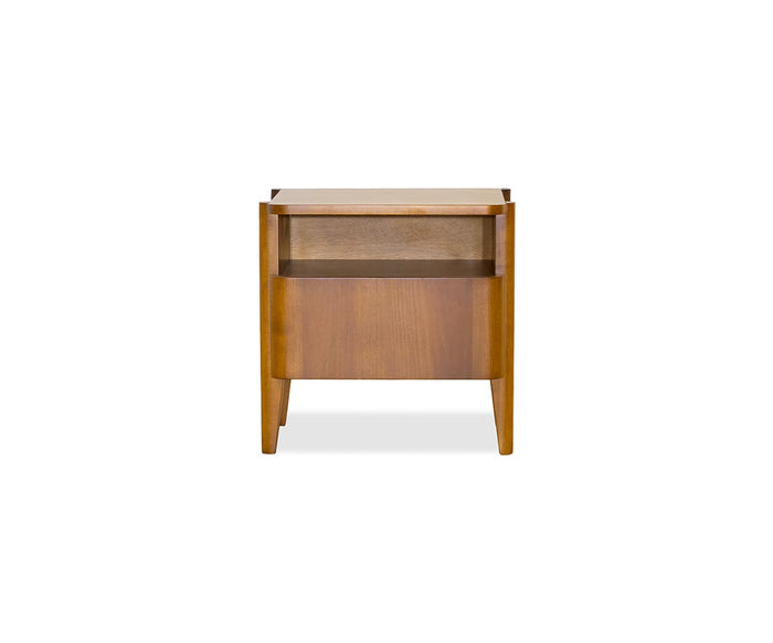 The Stefan Nightstand, shown in timber brown on a white background, features a simple and modern Scandinavian design with clean lines, tapered legs, an open shelf, and a lower drawer.