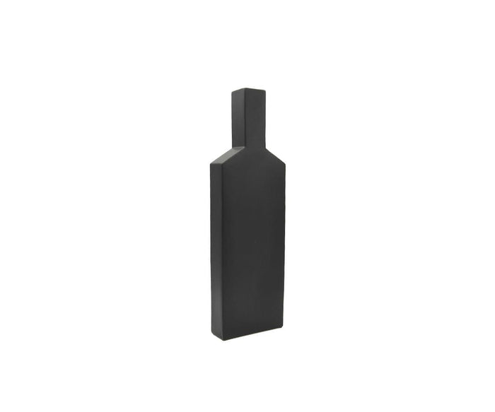 The Tall Silhouette Vase is a matte black, rectangular piece with a narrow neck and flat base, its contemporary design evoking a minimalist abstract bottle or geometric sculpture, displayed against a plain white background.