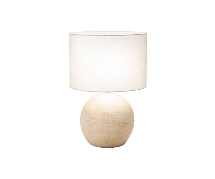 The Textured Clay Lamp showcases a round, textured clay base in beige paired with a simple white fabric lampshade, all set against a plain white background.