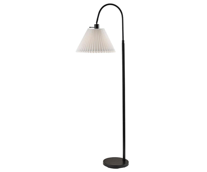 The Thalia Floor Lamp in black features a round base, a tall slender pole, an arched neck, and a white pleated lampshade. Its modern design effortlessly combines sophistication with practicality, making it a perfect choice for contemporary interiors.