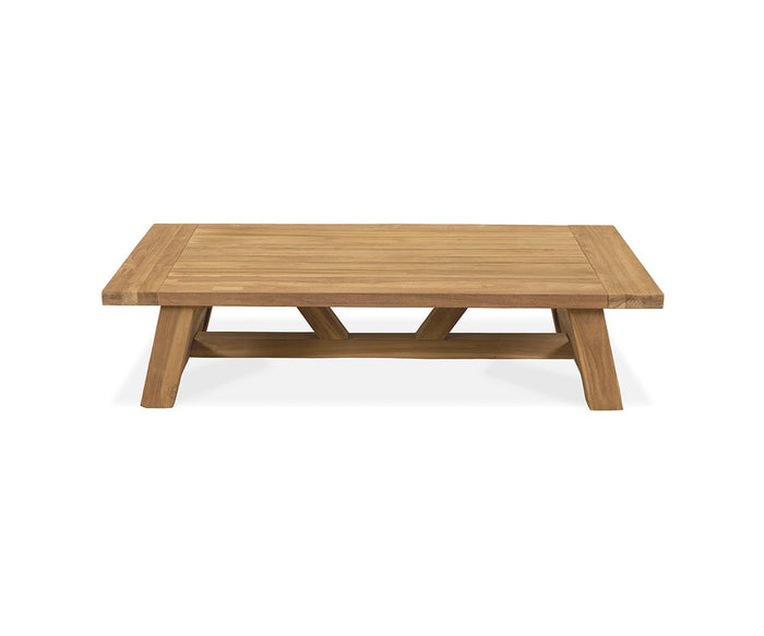 Introducing the Thorvid Outdoor Coffee Table in Natural Teak. This rectangular table is crafted from solid teak and features a slatted top with angled, sturdy legs joined by a horizontal crossbar for enhanced stability. Its natural finish highlights the beauty of teak wood, while its weather-resistant design makes it perfect for patios or gardens.