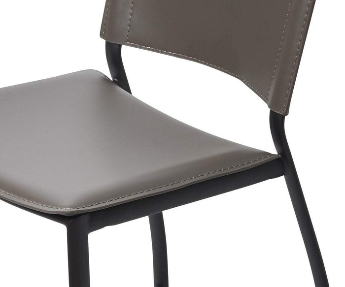 Close-up of the Torren Counter Stool, showcasing its modern design with a gray cushioned seat and backrest, black metal legs, and detailed visible stitching along the edges.