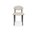 The Turi Dining Chair in Turi Cream features a modern design with a rounded backrest, matching cushioned seat, and four slim black metal frame legs, displayed against a white background.