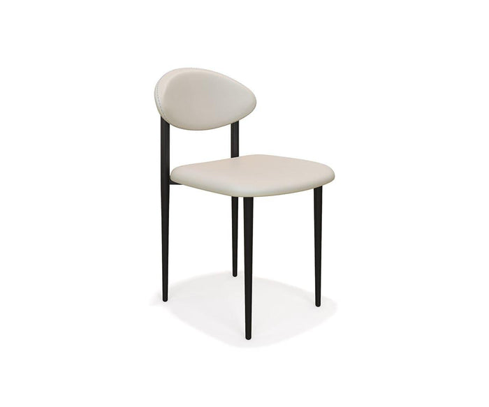 The Turi Dining Chair showcases a modern design with a curved, light beige cushioned seat and backrest, supported by three slender black metal legs, set against a plain white background.