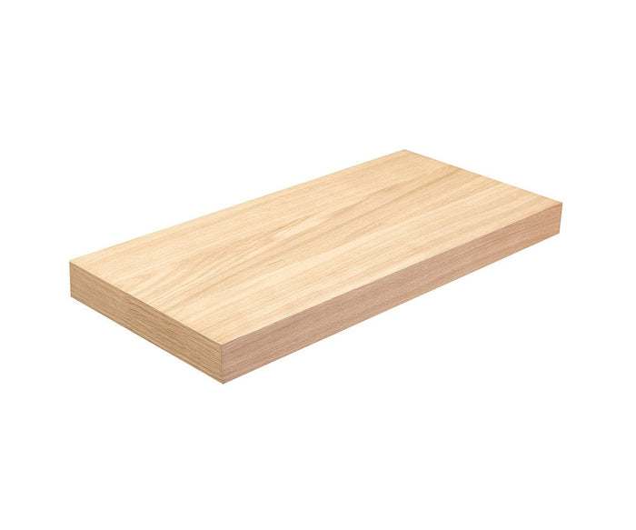 A rectangular Ulin 24″ Shelf in a white oak finish, displayed against a white background. This modern floating shelf combines style and versatility, making it a perfect addition to any space.