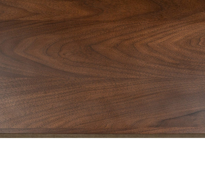 A close-up view of the Ulin 36″ Shelf showcases its smooth wooden surface with natural brown grain patterns and subtle color variations, making it ideal for crafting a modern floating shelf.