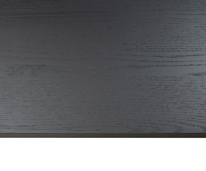 Close-up of the Ulin 36″ Shelf in dark wood, showcasing its visible wood grain texture across most of the image, with a small strip of white space along the bottom edge—ideal for emphasizing the refined finish of this modern shelf.