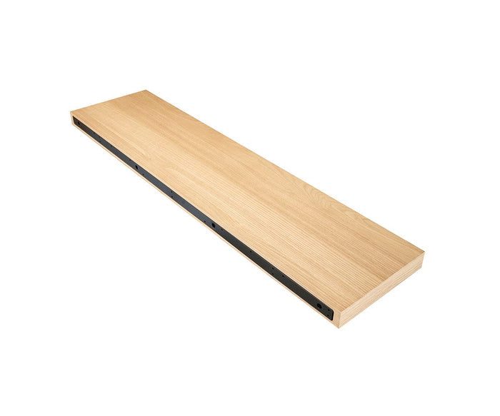 The Ulin 48″ Shelf is a rectangular, light wood floating shelf featuring a black metal mounting bracket along one side, showcased against a white background.