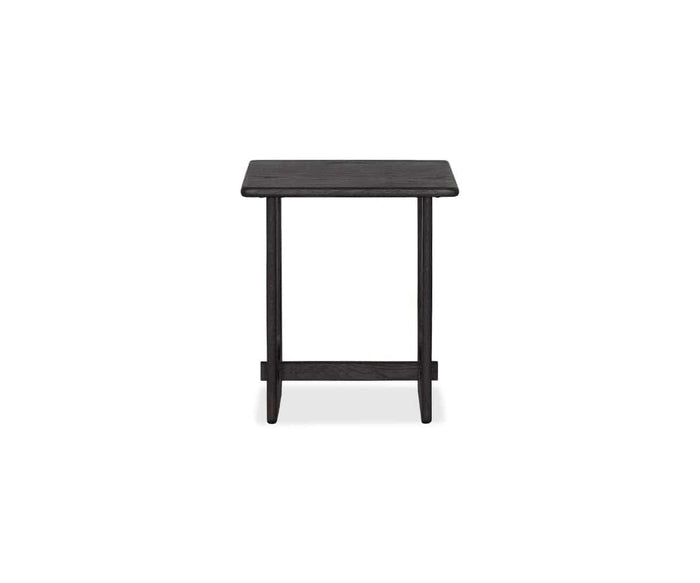 A compact, square Unni Side Table in dark oak with four straight legs and a horizontal support bar near the bottom is displayed against a white background.