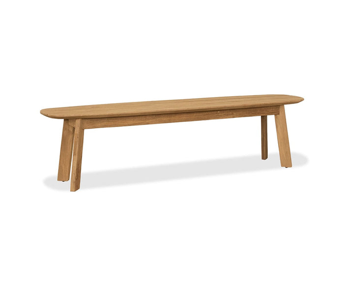 The Vinicio Outdoor Bench features a smooth, elongated rectangular seat crafted from solid teak and is supported by four angled legs, showcasing clean lines and contemporary elegance characteristic of modern outdoor furniture, as displayed on a white background.