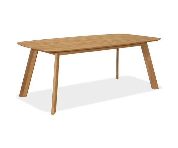 Introducing the Vinicio Outdoor Dining Table: a rectangular table crafted from solid teak with angled legs, showcased against a white background. Its smooth, natural finish and clean, modern lines make it an ideal choice for anyone seeking elegant outdoor furniture with contemporary style.