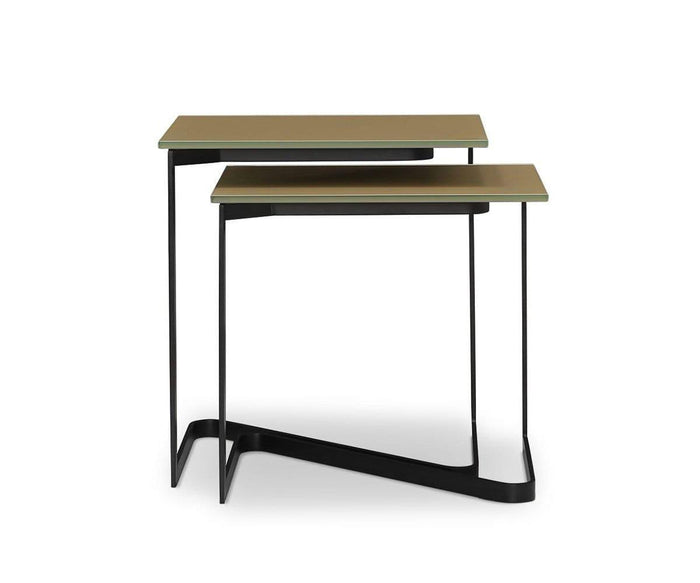 Two modern Vinstra Nesting Tables with slim black metal frames and rectangular latte tops are featured, one slightly smaller and neatly tucked under the other, set against a white background. The Vinstra Nesting Tables add a contemporary touch to any space with their sleek latte and black design and practical nesting functionality.