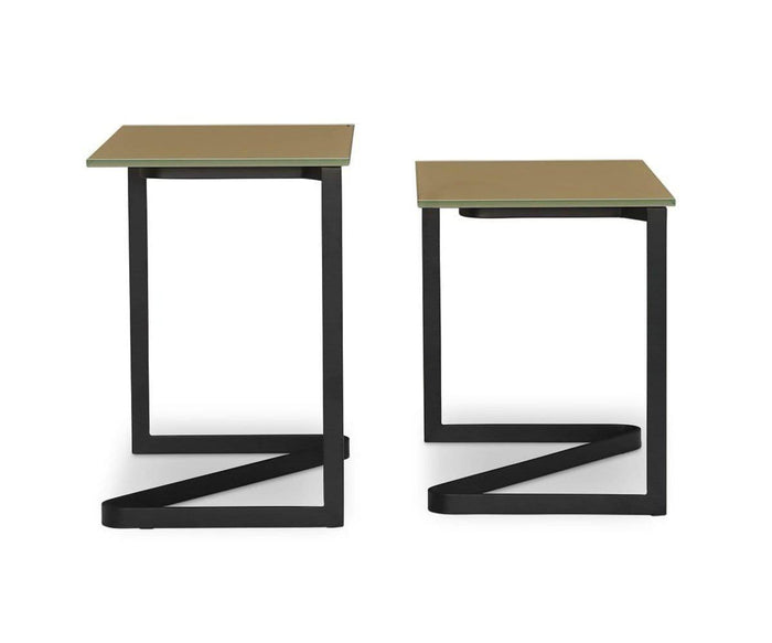 The Vinstra Nesting Tables consist of two contemporary side tables, each with a tan rectangular top and black metal base. Featuring a striking geometric Z-shaped design and differing slightly in height, these tables blend modern style with versatile functionality.