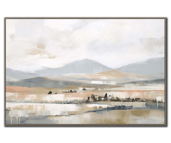 Bring tranquil beauty into your home with the Whisper Valley Wall Art. This multi-colored abstract landscape features softly blended mountains in the background, a gentle cloudy sky, and subtle hints of trees and buildings across fields in the foreground. Perfect as serene wall decor for any space.