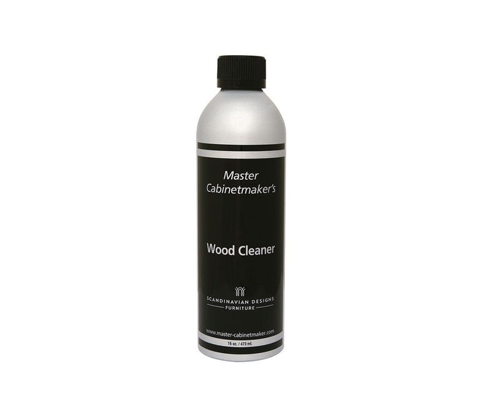 A silver and black bottle of Wood Cleaner, featuring a black cap and product label, perfect for gently cleansing indoor wood surfaces with a natural wood cleaner.